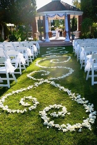 Form an aisle runner out of rose petals