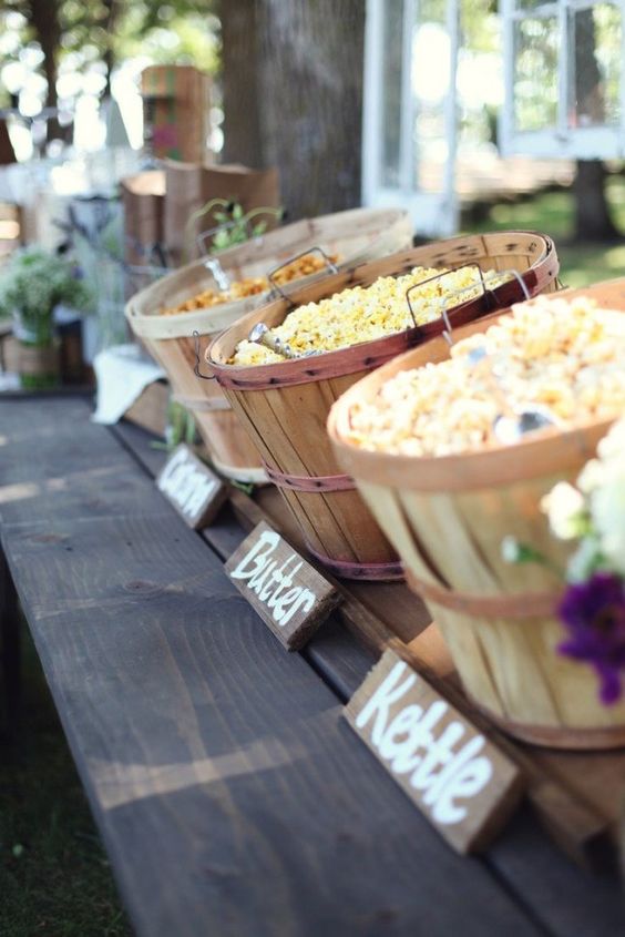 Add a popcorn bar to an outdoor wedding