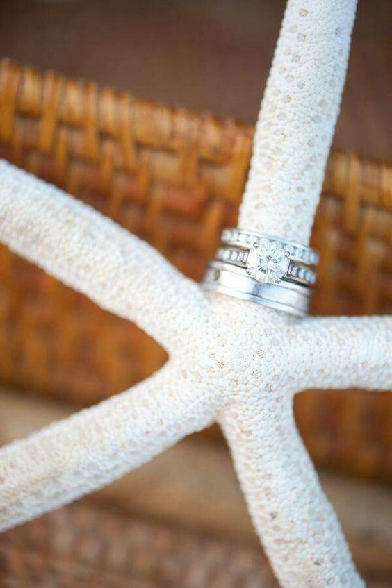Beach wedding and this ring shot
